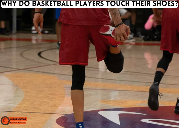 Why do basketball players touch their shoes